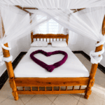 Accommodations familyroom showing mainroom twinroom twinbeds villa verona gardens 2