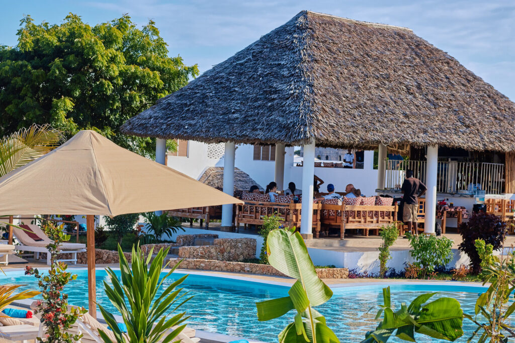 Watamu and Malindi Day Trips: The Ultimate Guide to Coastal Adventures villa verona gardens watamu swimming pool sunbathing relaxing outdoor swimmingpool restaurant view